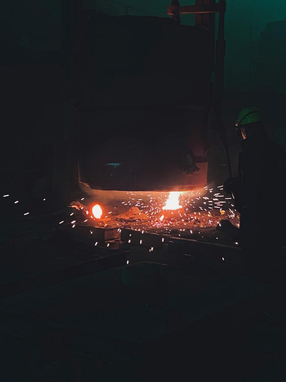Industrial workshop with welding sparks